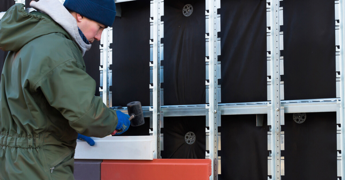 Tasker performing a Cladding job.
